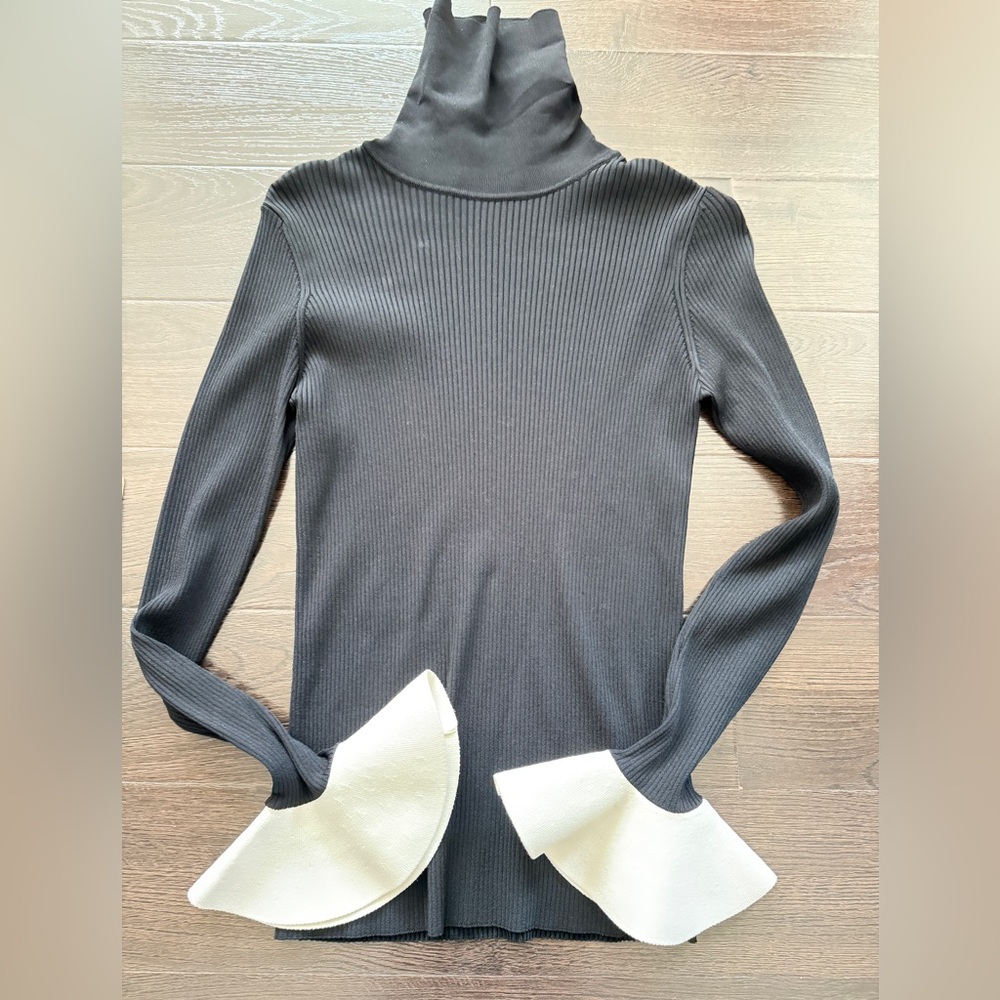 Valentino Garavani Black Turtleneck Top with White Flounce Cuffs